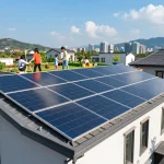 Showcasing technology TOPCon nel fotovoltaico, this image features solar panels on a sunny rooftop with a family enjoying outdoor life.